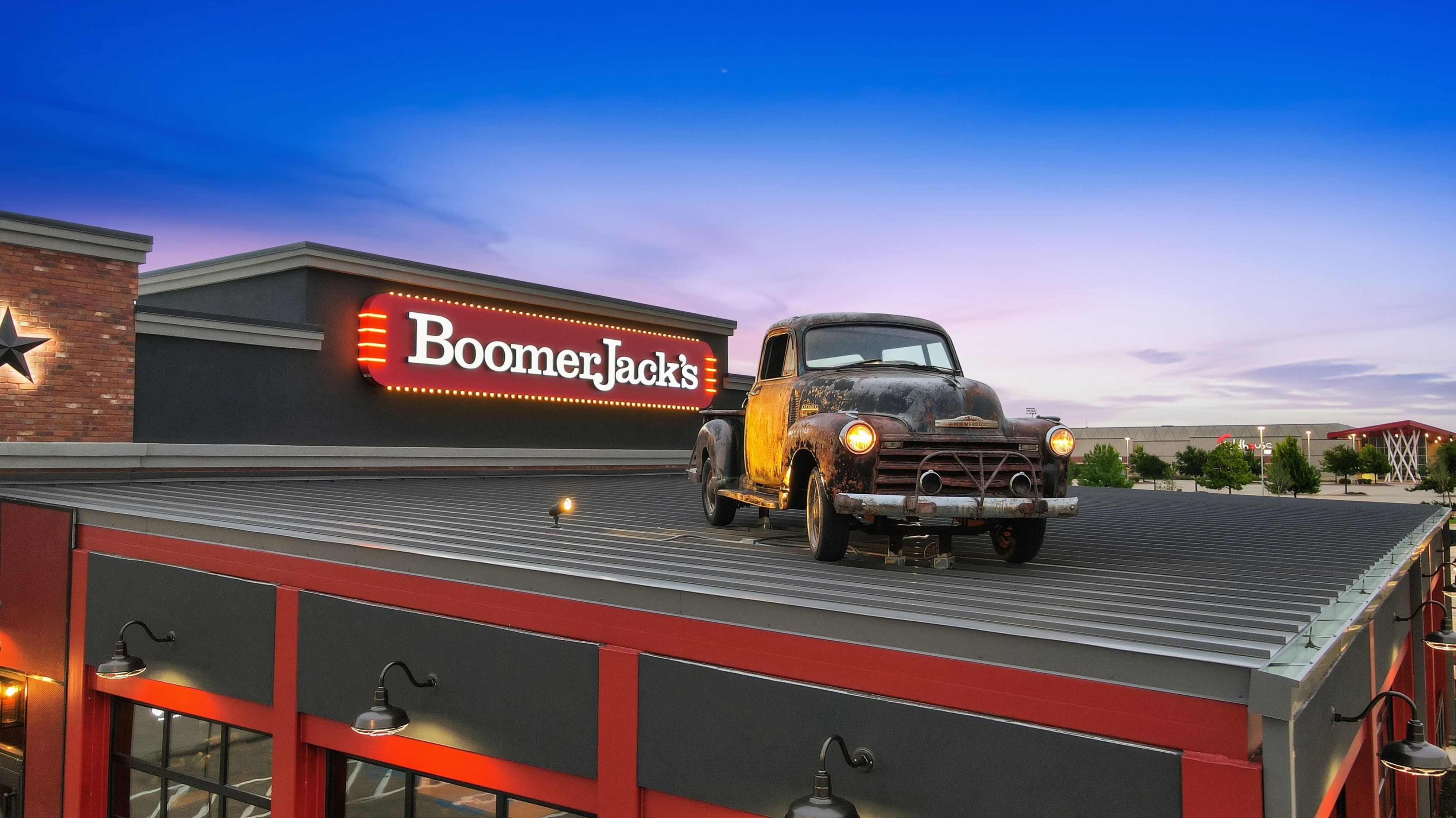 Rooftop truck at dusk — BoomerJack's Mansfield