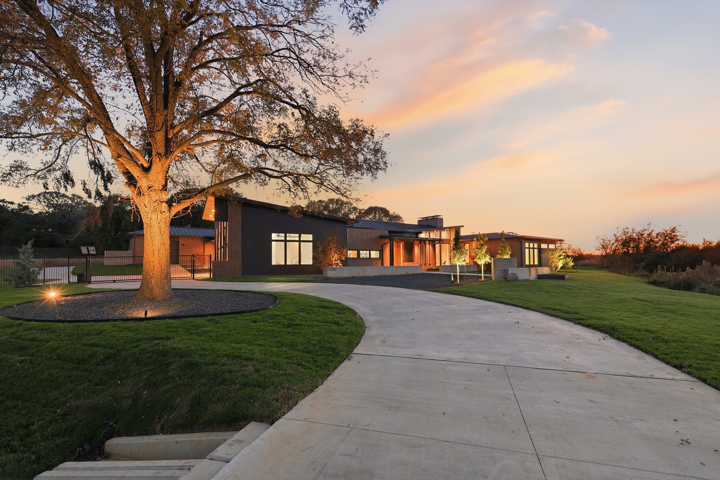 Modern home at twilight — McKinney, DFW